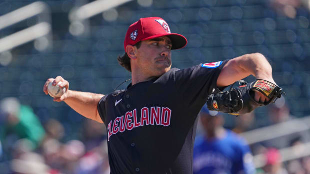 Mar 2, 2024; Goodyear, Arizona, USA; Cleveland Guardians starting pitcher Shane Bieber (57) pitches against the Kansas City Royals during the first inning at Goodyear Ballpark. Mandatory Credit: Joe Camporeale-USA TODAY Sports